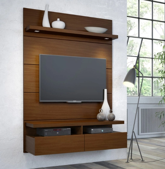 Contemporary entertainment unit showcasing a TV and an elegant shelf for organizing media items.