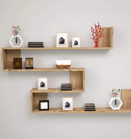 A wooden shelf adorned with various items, highlighting the quality of wall shelf craftsmanship.